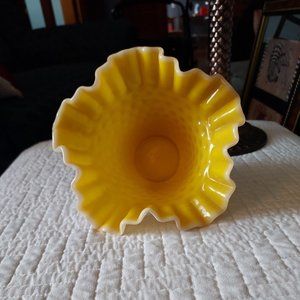 Milk glass hobnail dish with yellow center